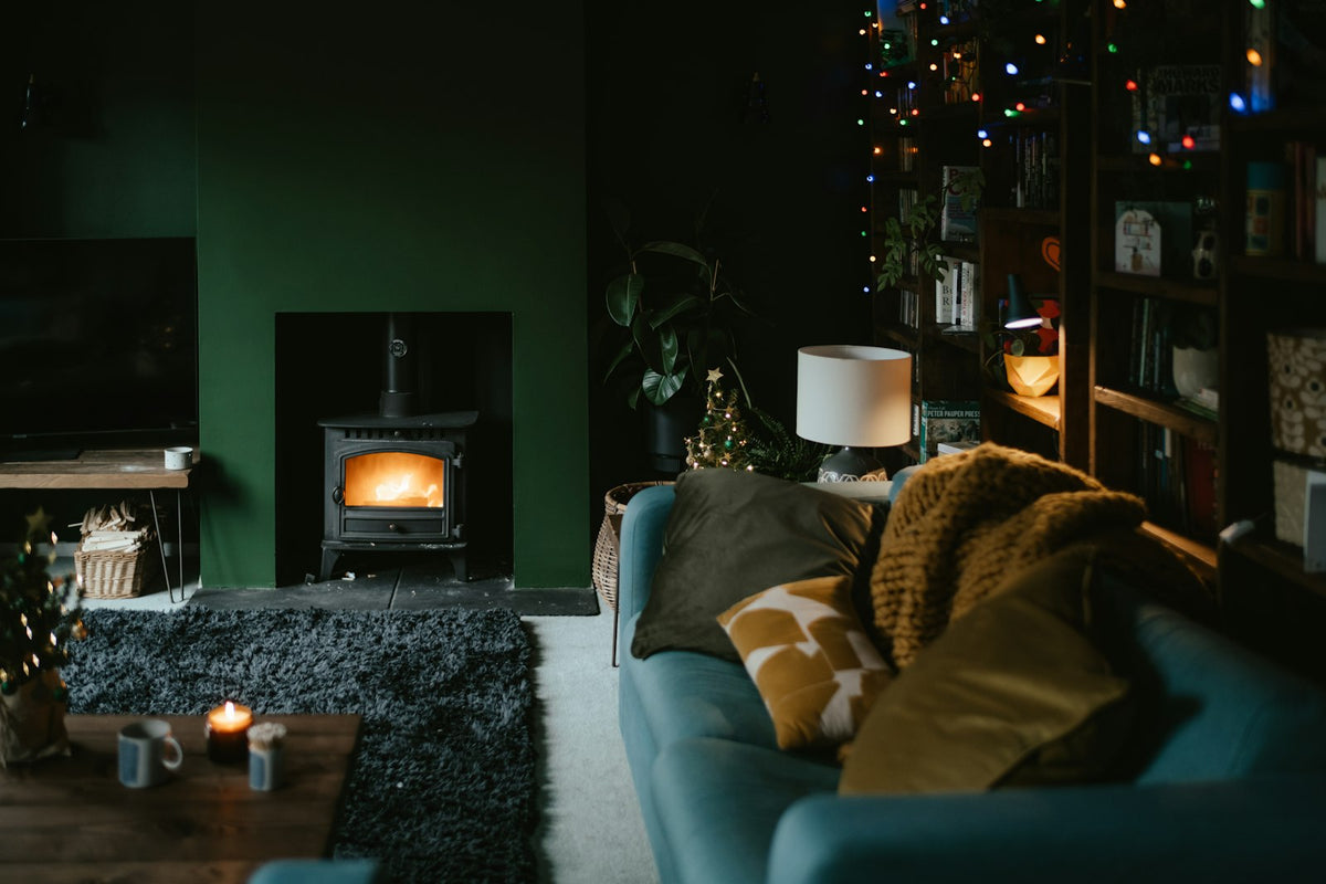 Cosy living room lit by lamps in the evening